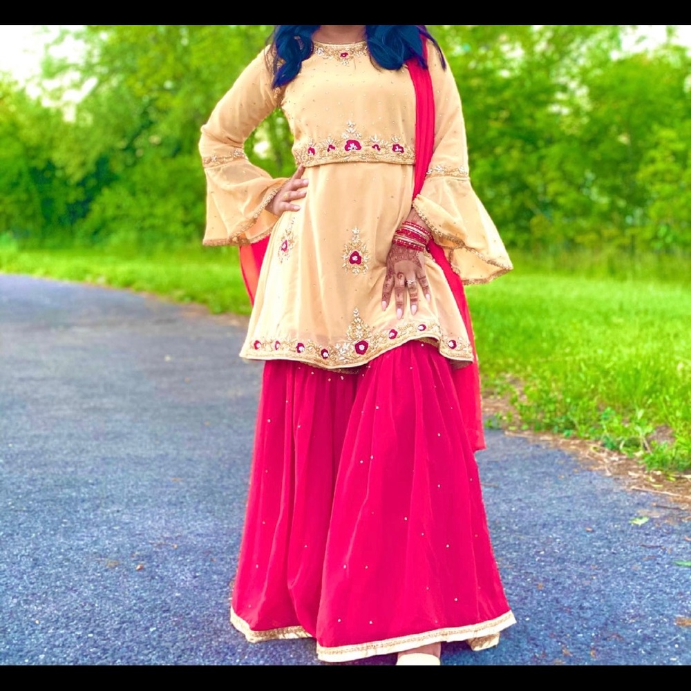 Party wear stone work Red and creme sharara suit
